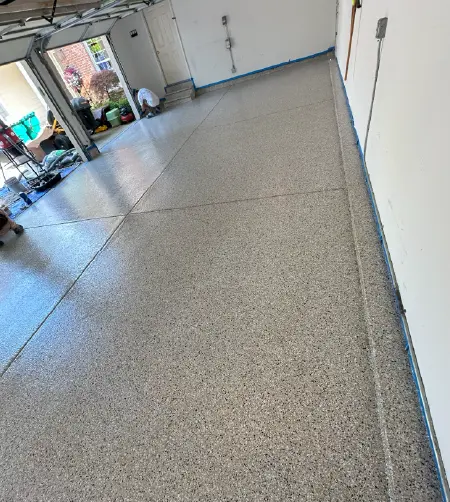 Services 11 Stylish black epoxy garage floor with flakes by DS Epoxy Floors LLC in Michigan
