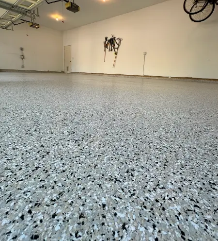 Services 8 Flakes epoxy garage floor finish for durability and style by DS Epoxy Floors LLC in Michigan