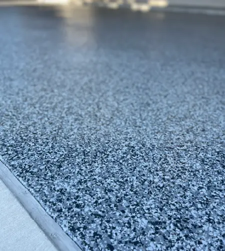 Services 10 High-gloss epoxy finish on residential garage floor by DS Epoxy Floors LLC in Michigan
