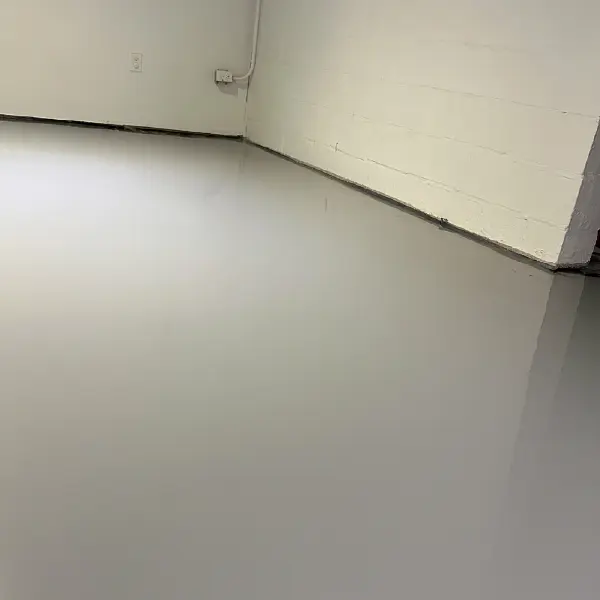 Services 5 Applying self-leveling compound on concrete floor in Michigan
